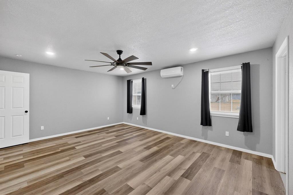 400 South Oak Street Ranger, TX 76470 - Photo 22 of 38 a view of an empty room with a window