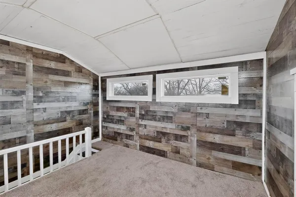a view of a room with racks on the wall