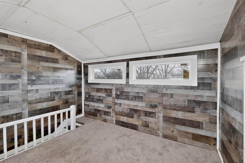 400 South Oak Street Ranger, TX 76470 - Photo 35 of 38 a view of a room with racks on the wall