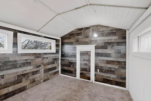 a view of a livingroom with shelves