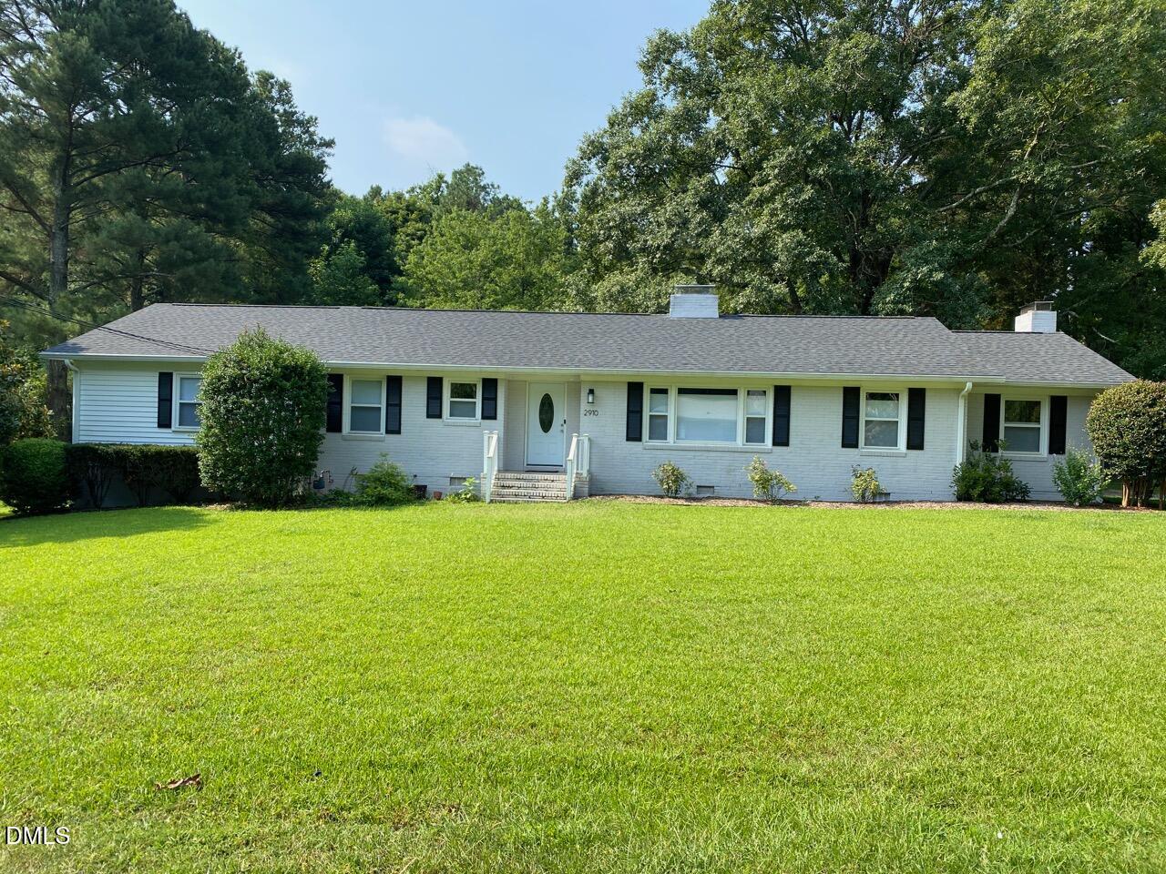 2910 Haven Road Raleigh, NC 27610 - Photo 1 of 26 a front view of a house with a garden