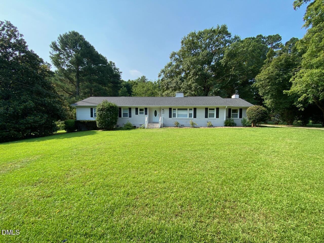 2910 Haven Road Raleigh, NC 27610 - Photo 2 of 26 a view of a house with a big yard