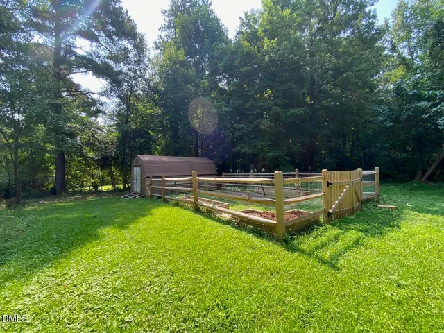 a garden view with a seating space