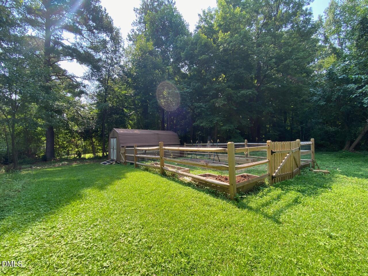 2910 Haven Road Raleigh, NC 27610 - Photo 26 of 26 a garden view with a seating space