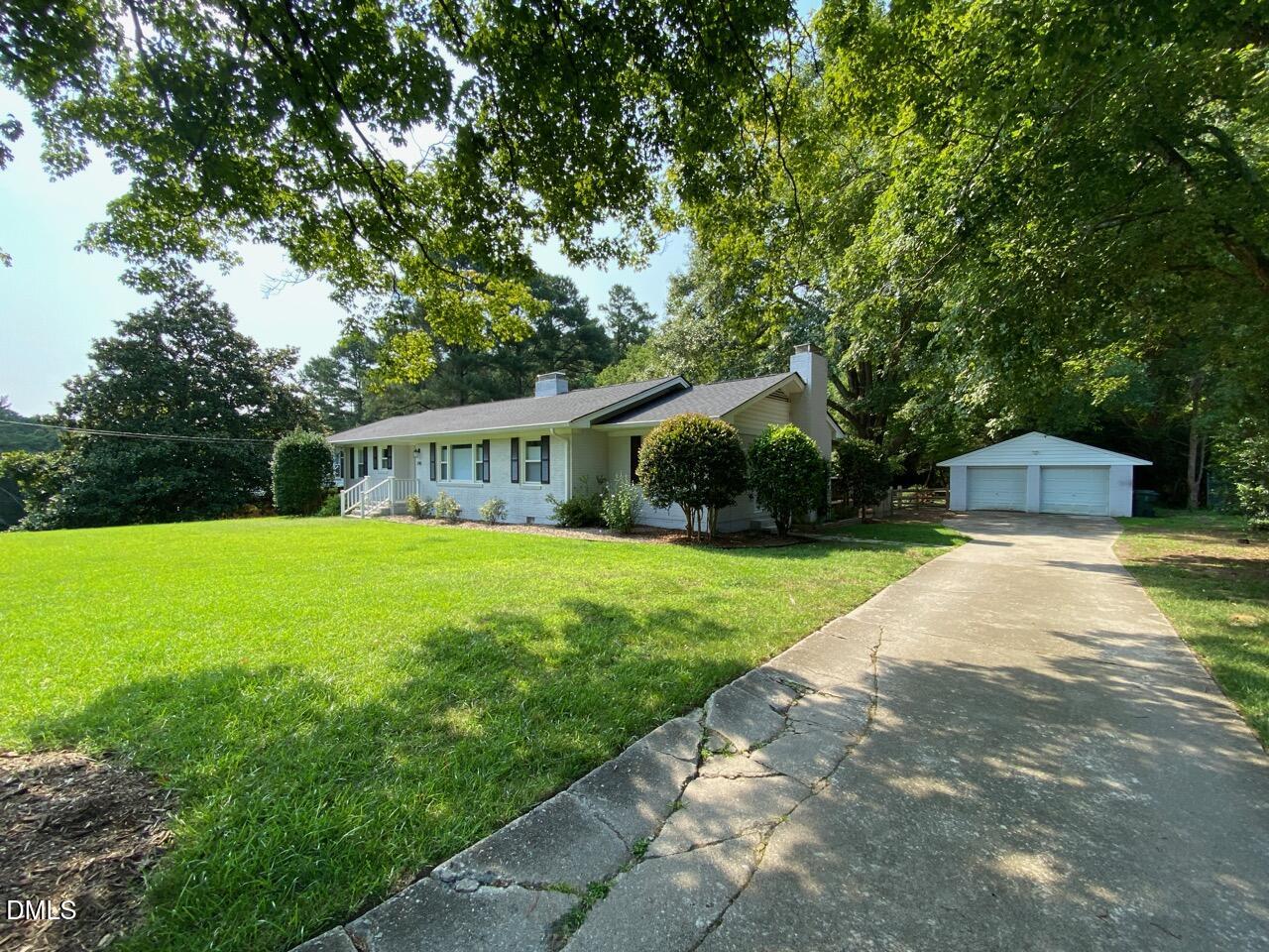 2910 Haven Road Raleigh, NC 27610 - Photo 3 of 26 a front view of house with yard and green space