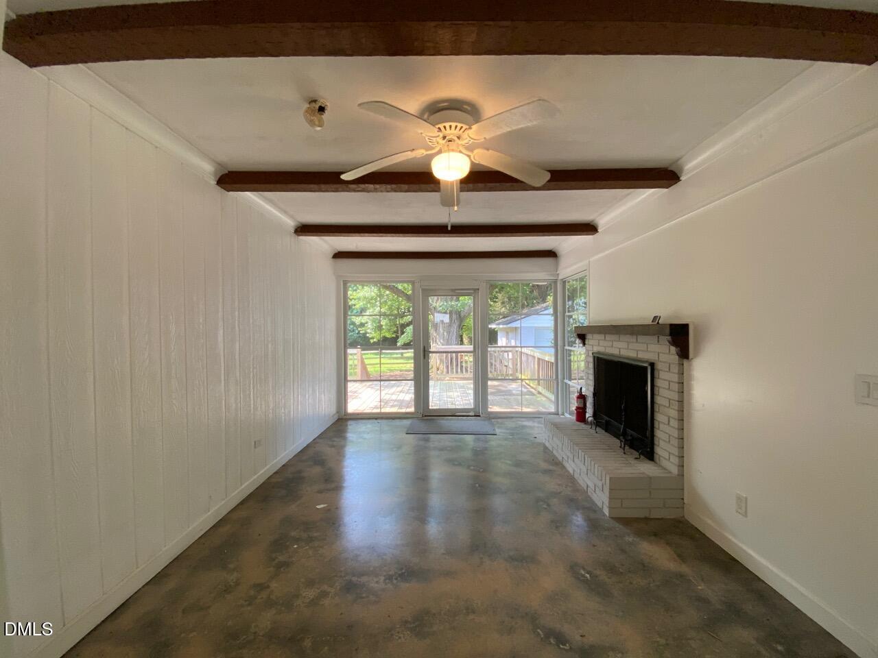 2910 Haven Road Raleigh, NC 27610 - Photo 4 of 26 a view of empty room with a fireplace