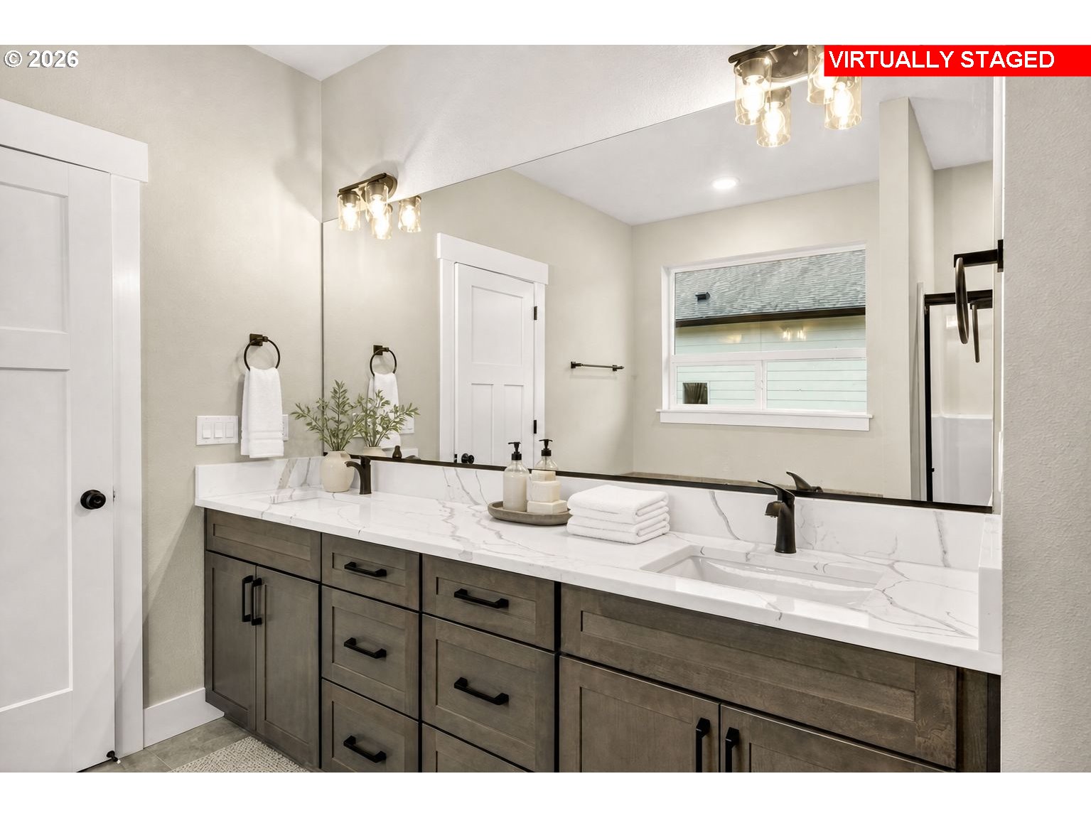 3352 Northeast Sweetwater Road, Unit 80 Estacada, OR 97023 - Photo 28 of 48 a bathroom with a double vanity sink and mirror