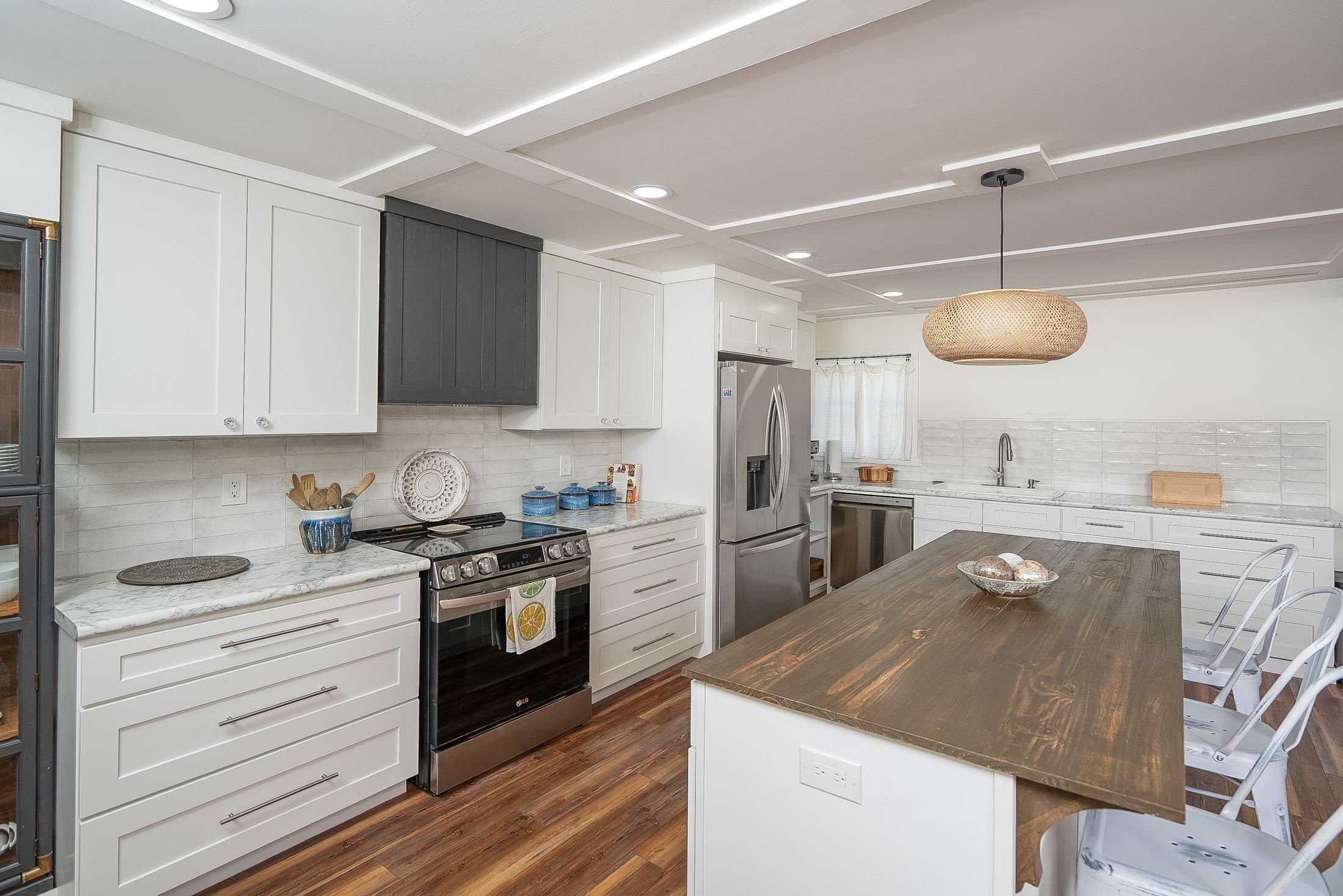 123 Esperanza Grove Road East Palatka, FL 32131 - Photo 12 of 59 a kitchen with a counter space cabinets and stainless steel appliances