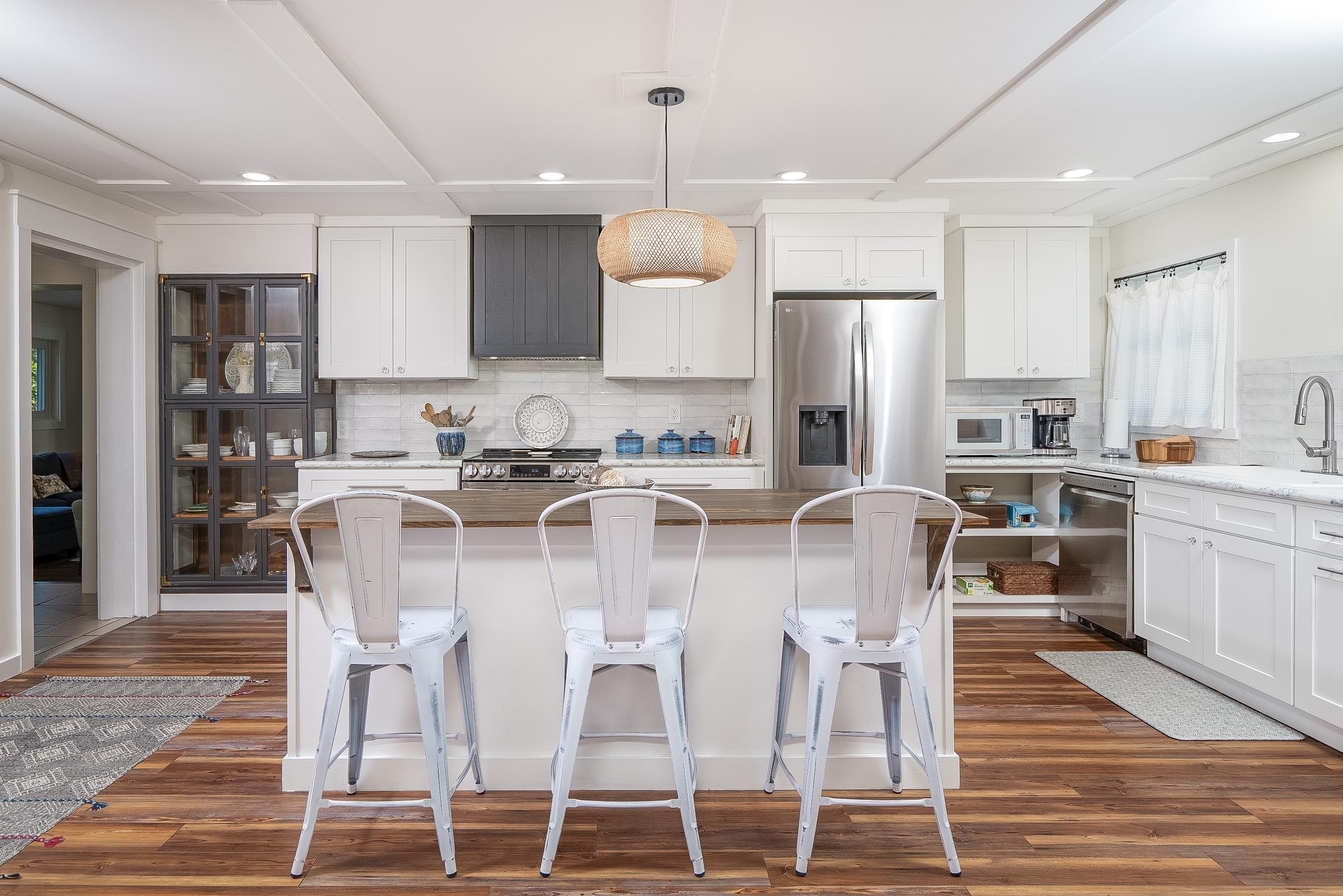 123 Esperanza Grove Road East Palatka, FL 32131 - Photo 15 of 59 Kitchen featuring a kitchen bar, white cabinets, wood counters, a center island, and recessed lighting