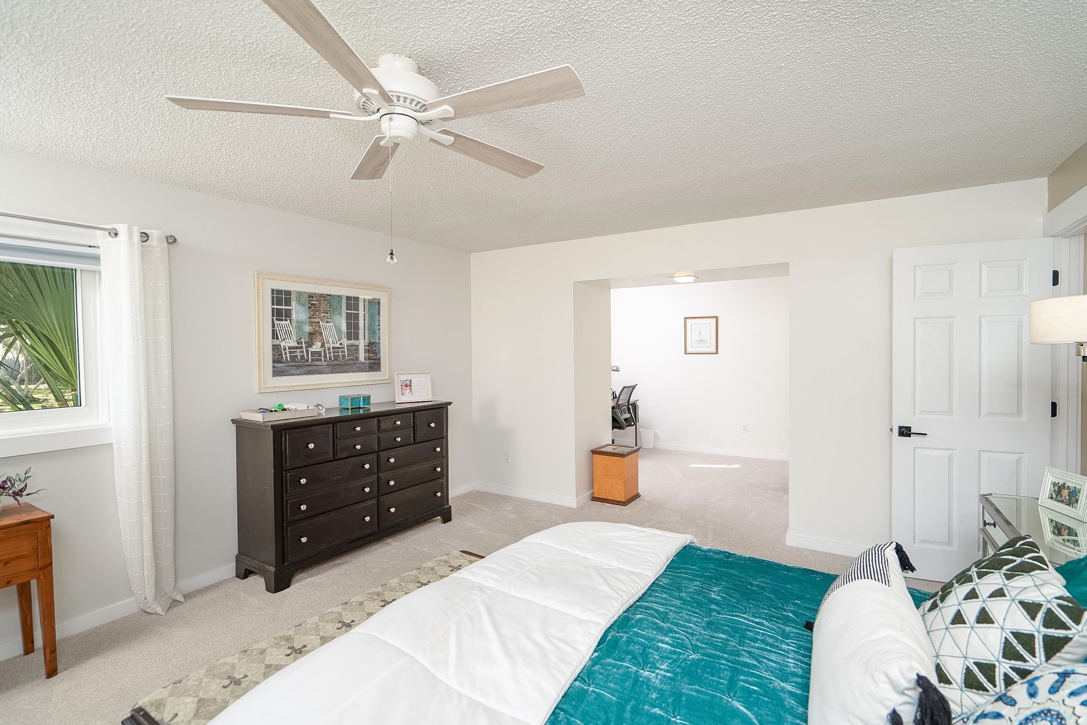 123 Esperanza Grove Road East Palatka, FL 32131 - Photo 26 of 59 Carpeted bedroom with a textured ceiling and ceiling fan