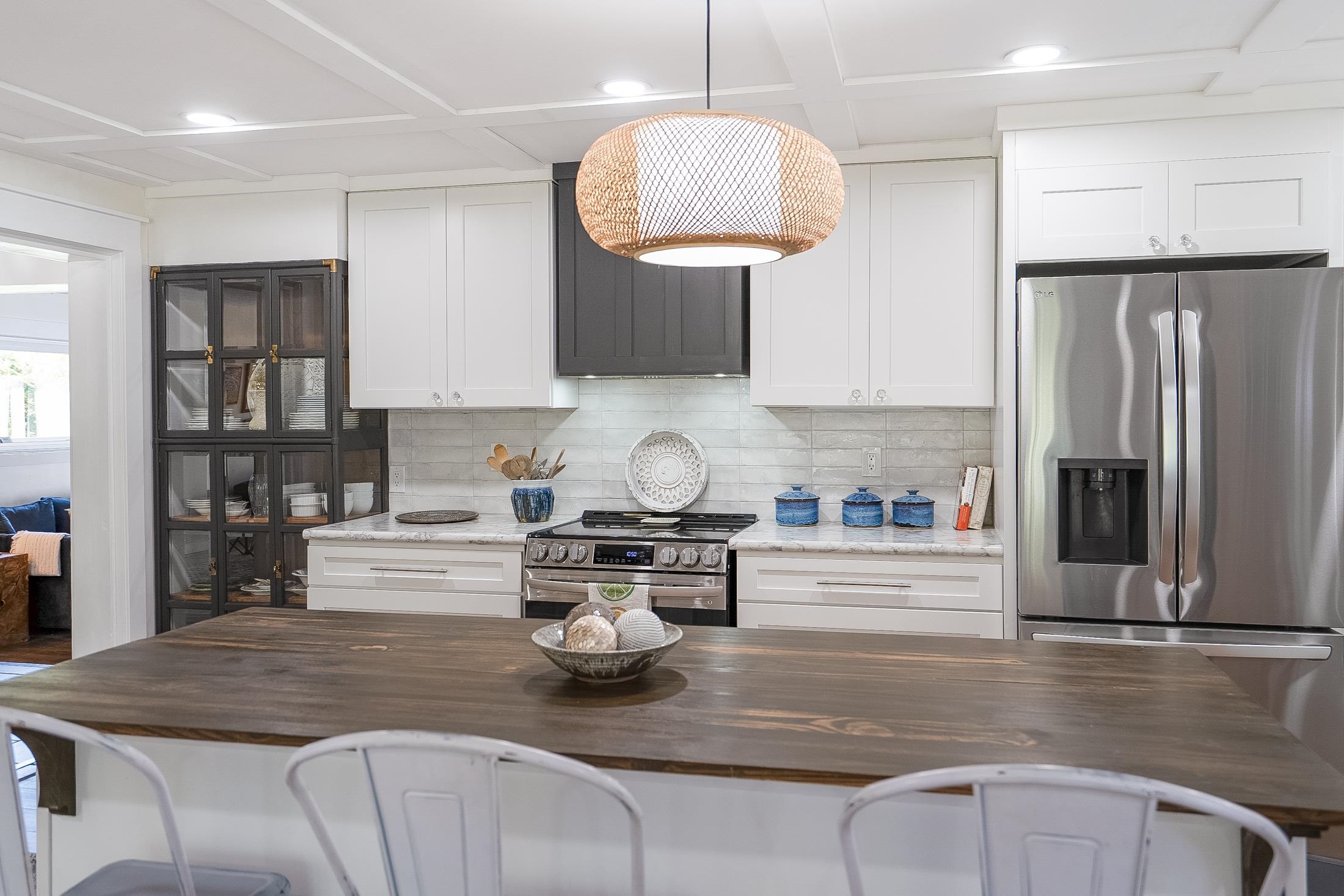 123 Esperanza Grove Road East Palatka, FL 32131 - Photo 3 of 59 Kitchen featuring white cabinets, wood counters, stainless steel appliances, backsplash, and recessed lighting