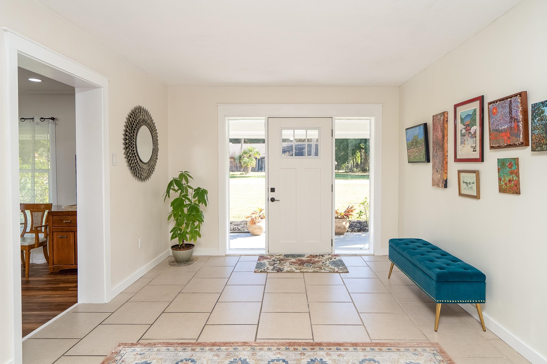 123 Esperanza Grove Road East Palatka, FL 32131 - Photo 6 of 59 Entryway featuring light tile patterned floors and baseboards