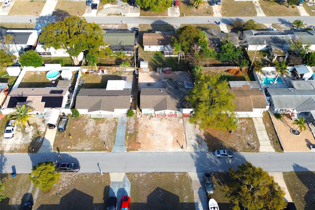 3542 Connon Drive New Port Richey, FL 34652 - Photo 11 of 47 an aerial view of multiple houses with yard