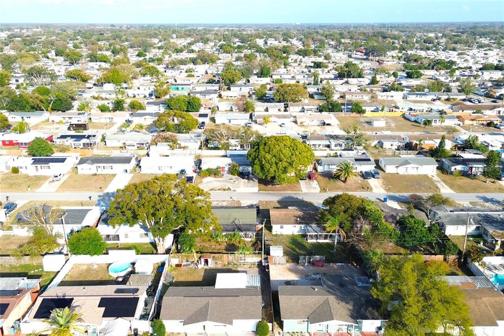 3542 Connon Drive New Port Richey, FL 34652 - Photo 15 of 47 an aerial view of residential houses with outdoor space