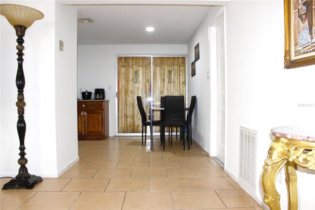 3542 Connon Drive New Port Richey, FL 34652 - Photo 36 of 47 a view of a dining room with furniture and a window