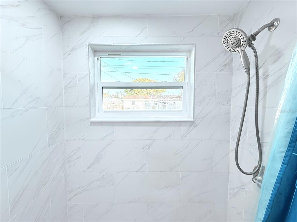 3542 Connon Drive New Port Richey, FL 34652 - Photo 44 of 47 a bathroom with a shower