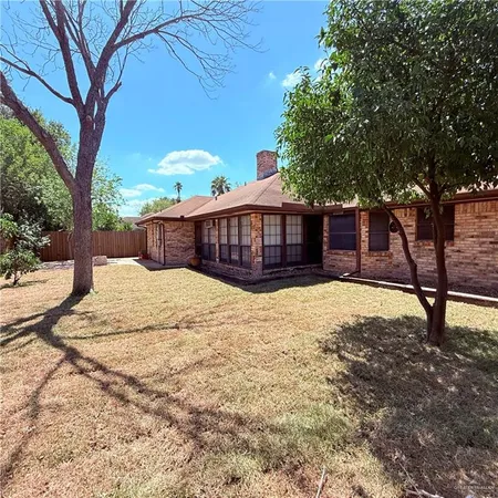 a view of a house with snow on the ground