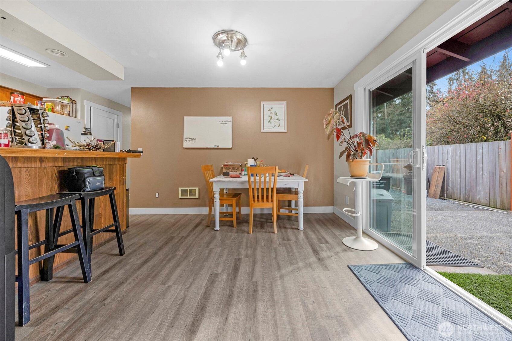 212 Madison Street Everett, WA 98203 - Photo 30 of 40 a dining room with furniture and wooden floor