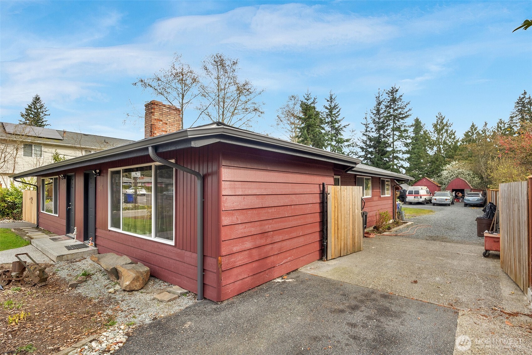 212 Madison Street Everett, WA 98203 - Photo 36 of 40 a view of a house with a space and a garage