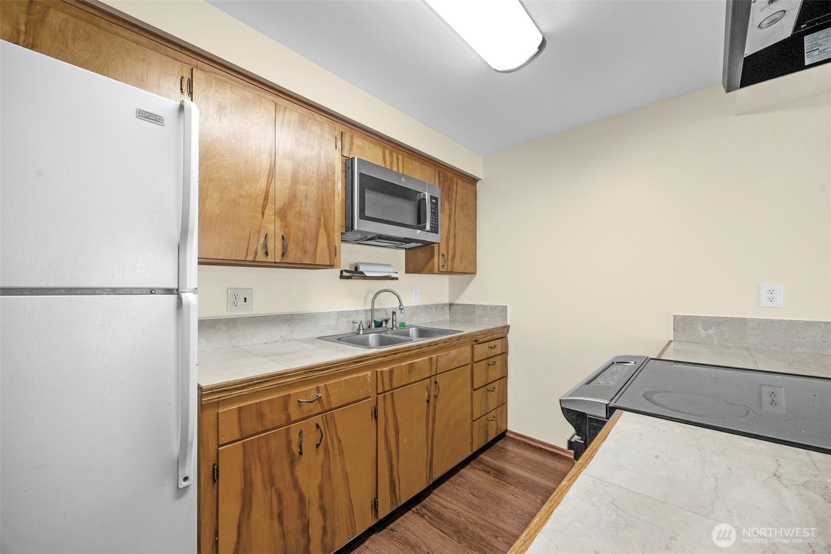 212 Madison Street Everett, WA 98203 - Photo 8 of 40 a bathroom with a sink and a mirror