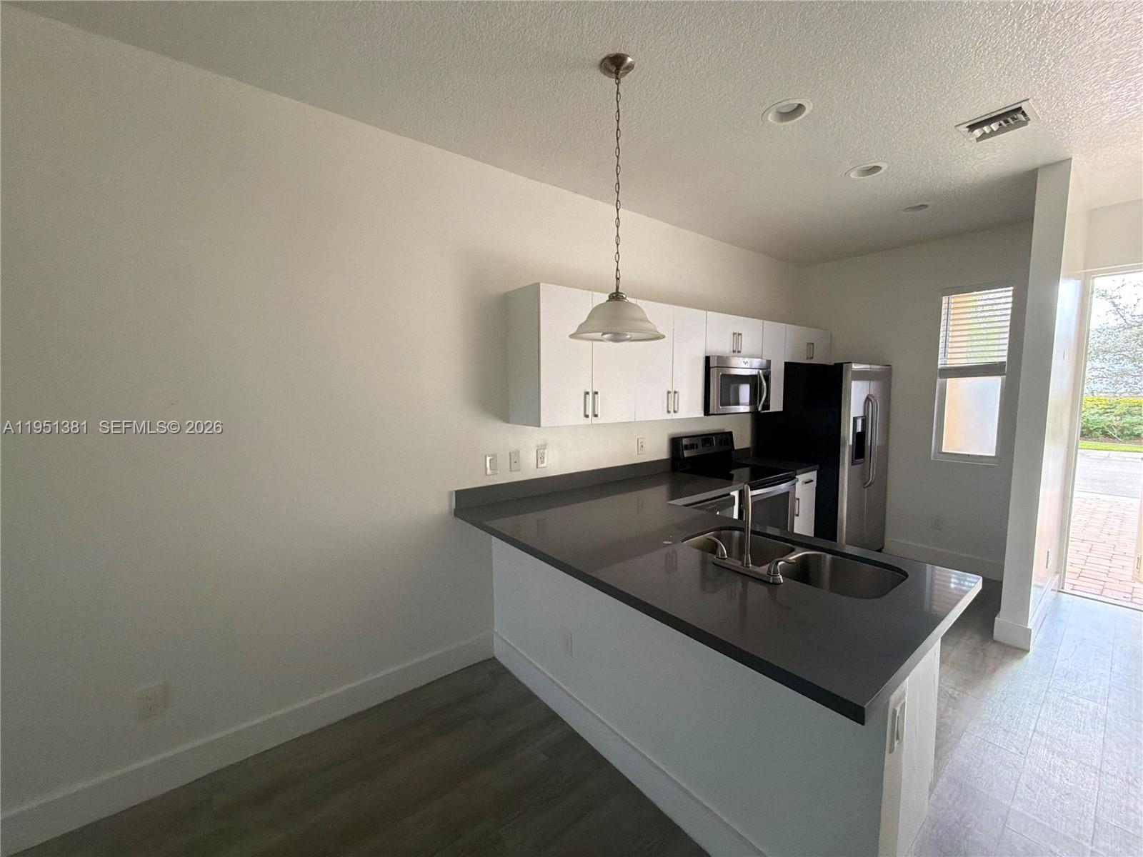 7658 Northwest 88th Terrace, Unit 12 Tamarac, FL 33321 - Photo 2 of 5