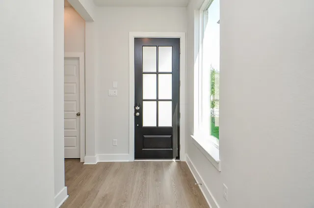 a view of an empty room and window