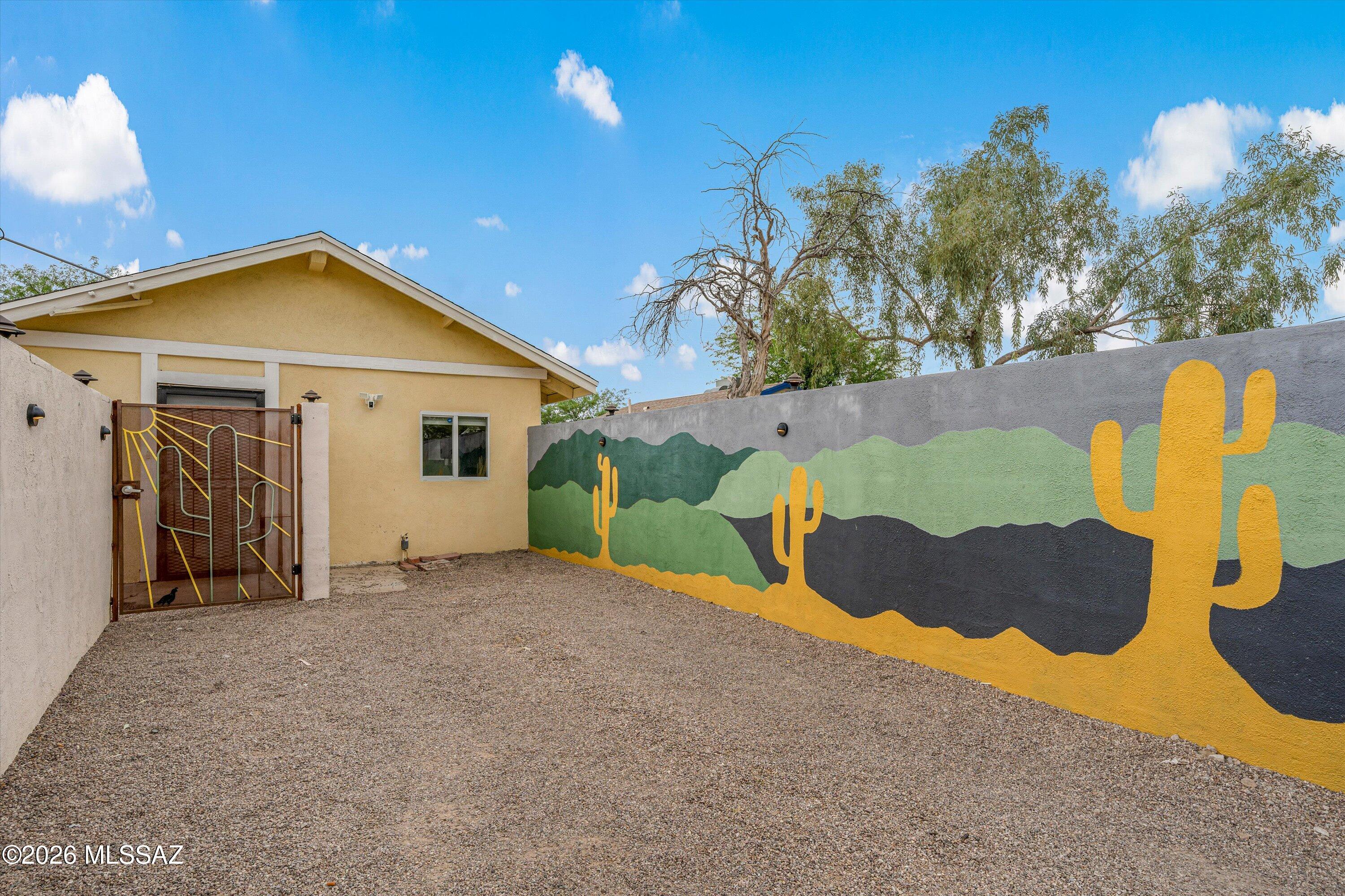 2841 North Richey Boulevard Tucson, AZ 85716 - Photo 1 of 30 a view of a house with a yard and sitting area