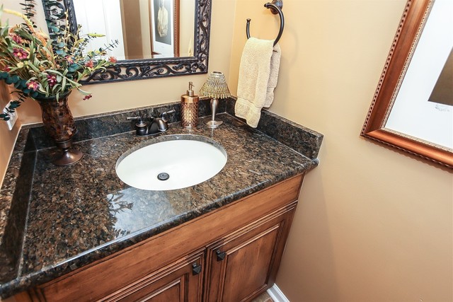 241 Timber Ridge Lane Lake Barrington, IL 60010 - Photo 15 of 33 a bathroom with a granite countertop sink and a mirror