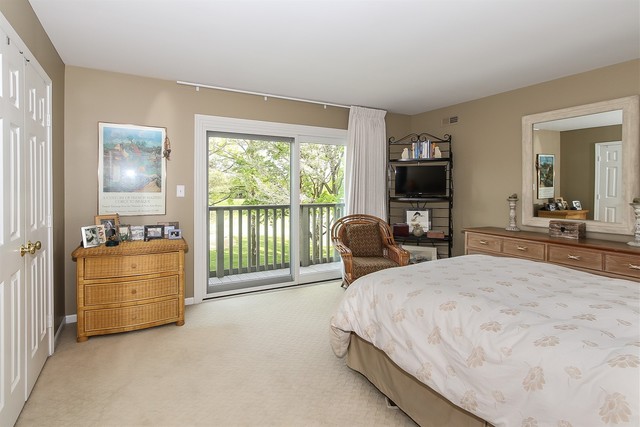 241 Timber Ridge Lane Lake Barrington, IL 60010 - Photo 16 of 33 a bedroom with furniture and a flat screen tv