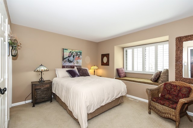 241 Timber Ridge Lane Lake Barrington, IL 60010 - Photo 20 of 33 a bedroom with a bed couch and two large window