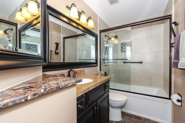 241 Timber Ridge Lane Lake Barrington, IL 60010 - Photo 22 of 33 a bathroom with a granite countertop sink toilet and shower