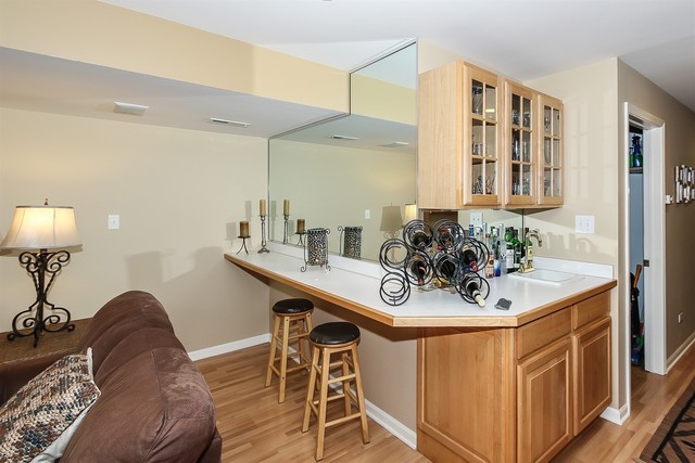 241 Timber Ridge Lane Lake Barrington, IL 60010 - Photo 25 of 33 a view of a hallway with furniture and wooden floor