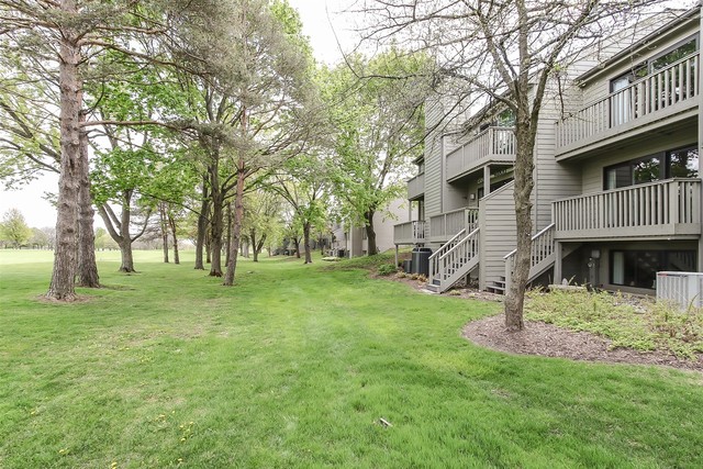 241 Timber Ridge Lane Lake Barrington, IL 60010 - Photo 27 of 33 a view of a house with a backyard porch and sitting area