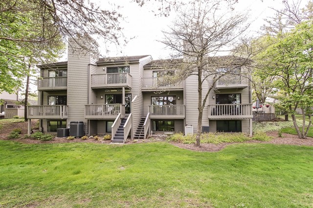 241 Timber Ridge Lane Lake Barrington, IL 60010 - Photo 28 of 33 a view of a building with a yard