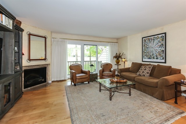 241 Timber Ridge Lane Lake Barrington, IL 60010 - Photo 5 of 33 a living room with furniture fireplace and a window