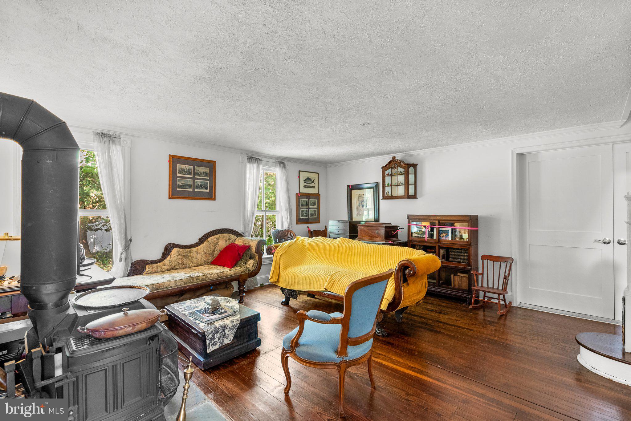 13321 Travilah Road Potomac, MD 20854 - Photo 14 of 43 a bedroom with furniture and wooden floor