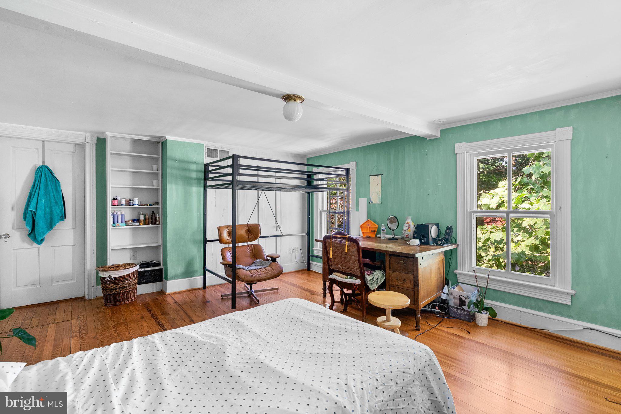 13321 Travilah Road Potomac, MD 20854 - Photo 26 of 43 a bedroom with a bed and a window