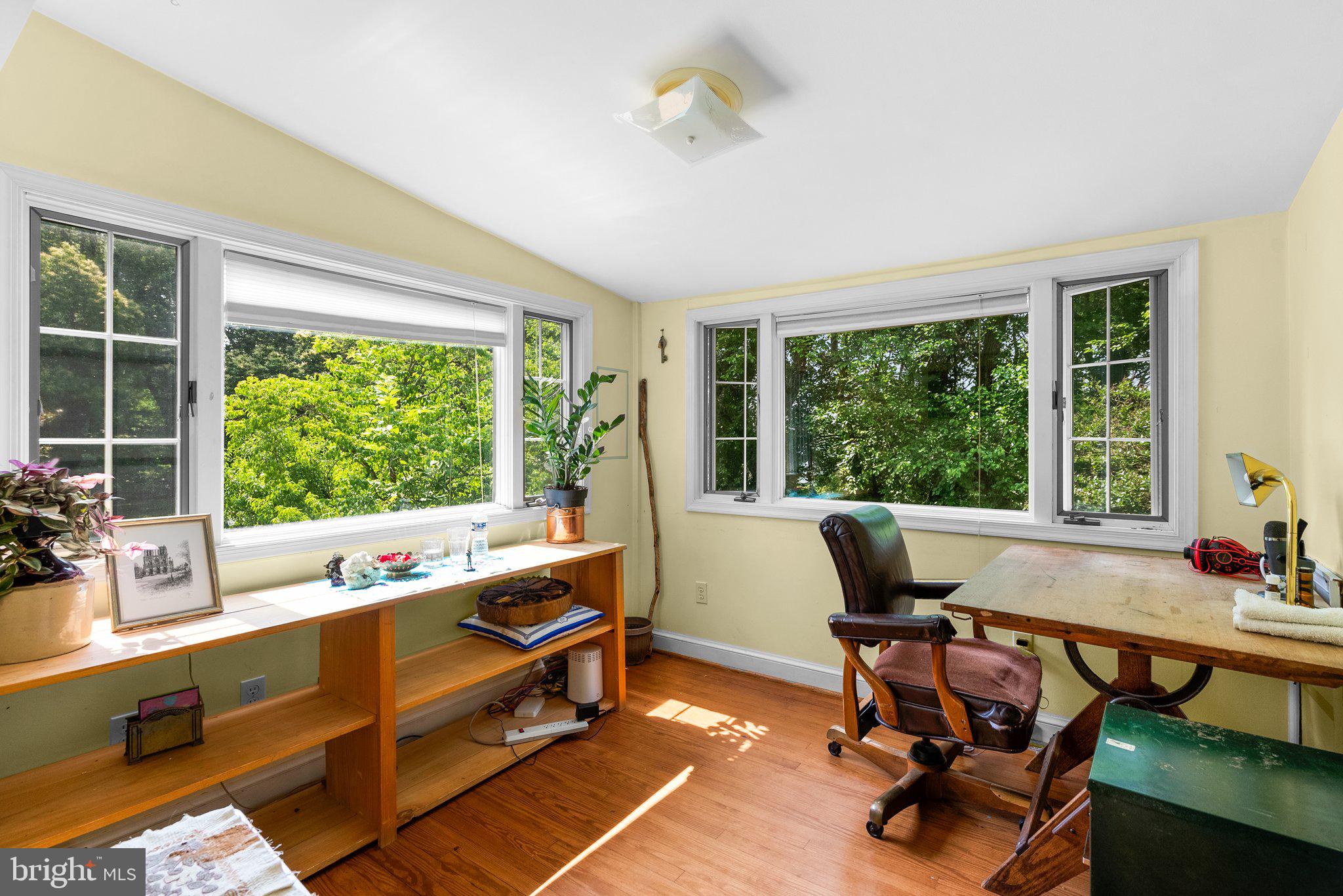 13321 Travilah Road Potomac, MD 20854 - Photo 32 of 43 a living room with furniture and windows