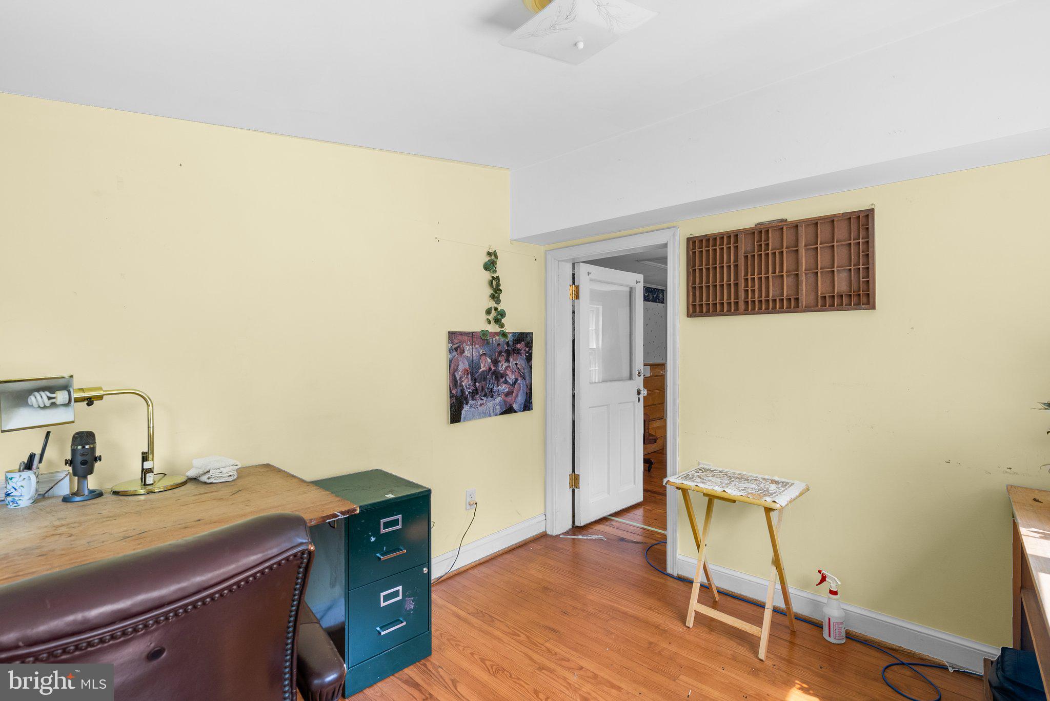 13321 Travilah Road Potomac, MD 20854 - Photo 33 of 43 a room with a wooden floor and a sink