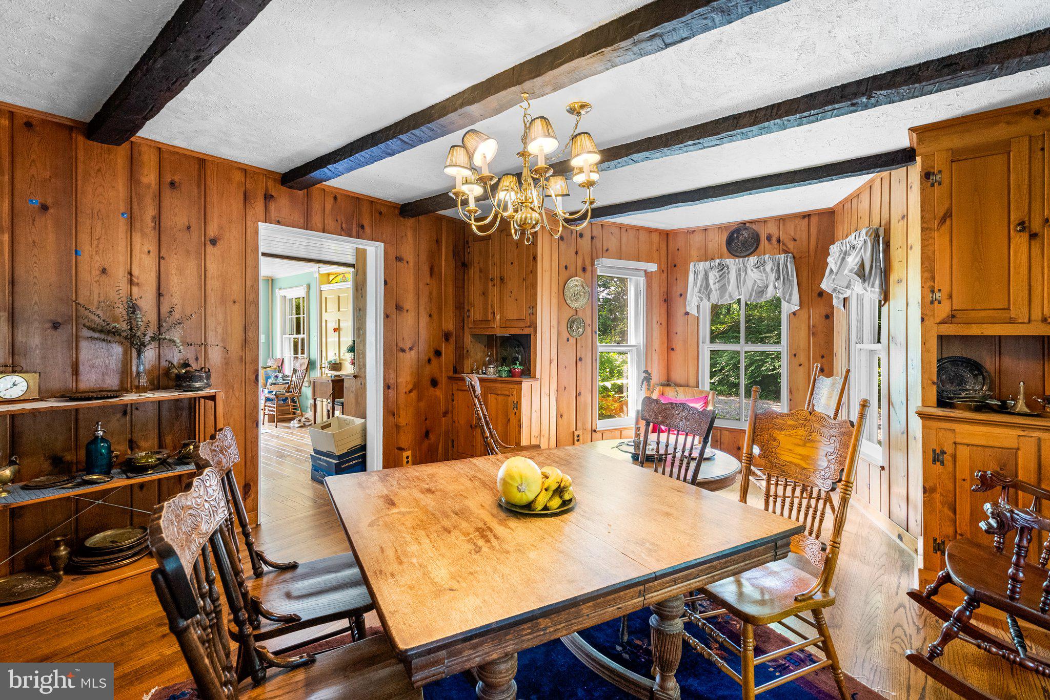 13321 Travilah Road Potomac, MD 20854 - Photo 9 of 43 a view of a dining room with furniture window and outside view