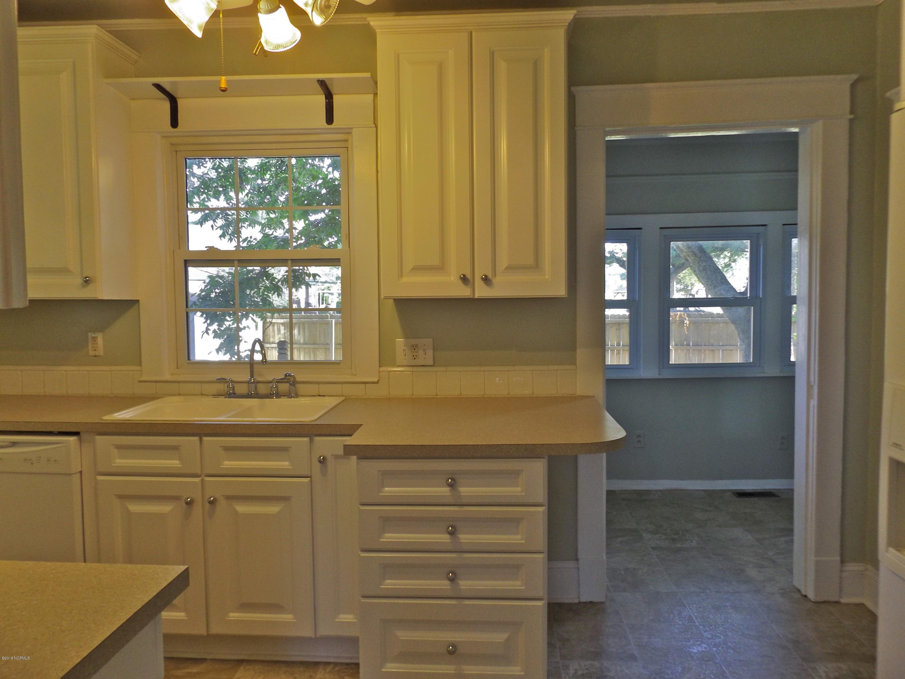 1412 Rhem Avenue New Bern, NC 28560 - Photo 17 of 28 Overlooks the Backyard & Connects to the Laundry Room