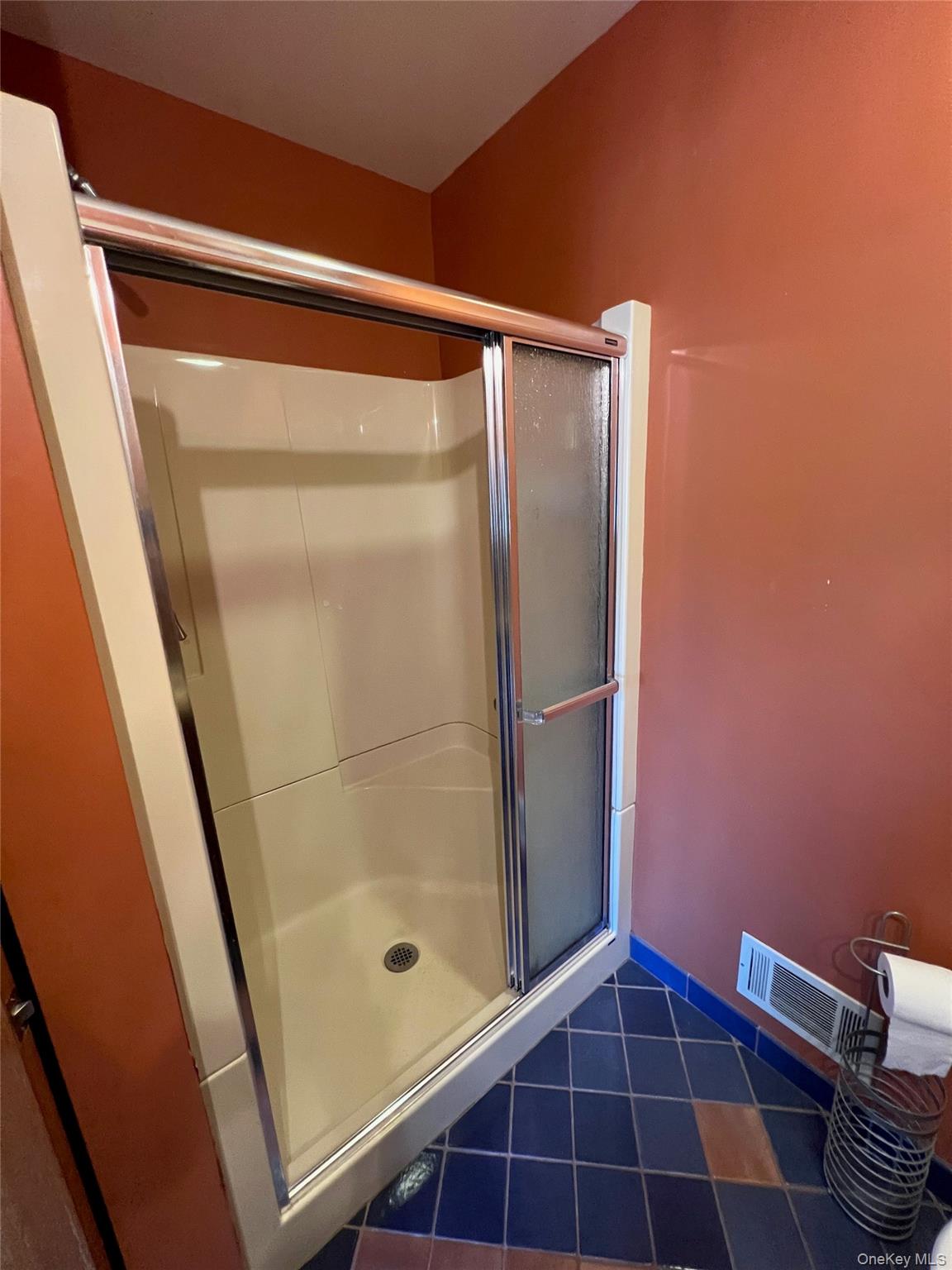 10 Squires Gate, Unit H Poughkeepsie, NY 12603 - Photo 18 of 24 a bathroom with a glass door shower
