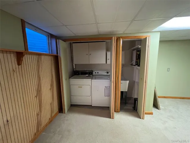 a utility room with cabinets