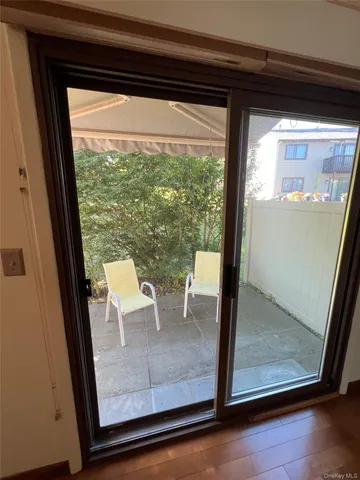 a view of a room with a large window