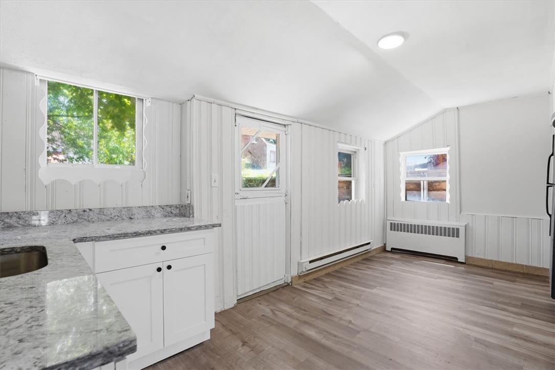508 Riegel Street Bethlehem, PA 18018 - Photo 7 of 21 a view of a kitchen with wooden floor and windows