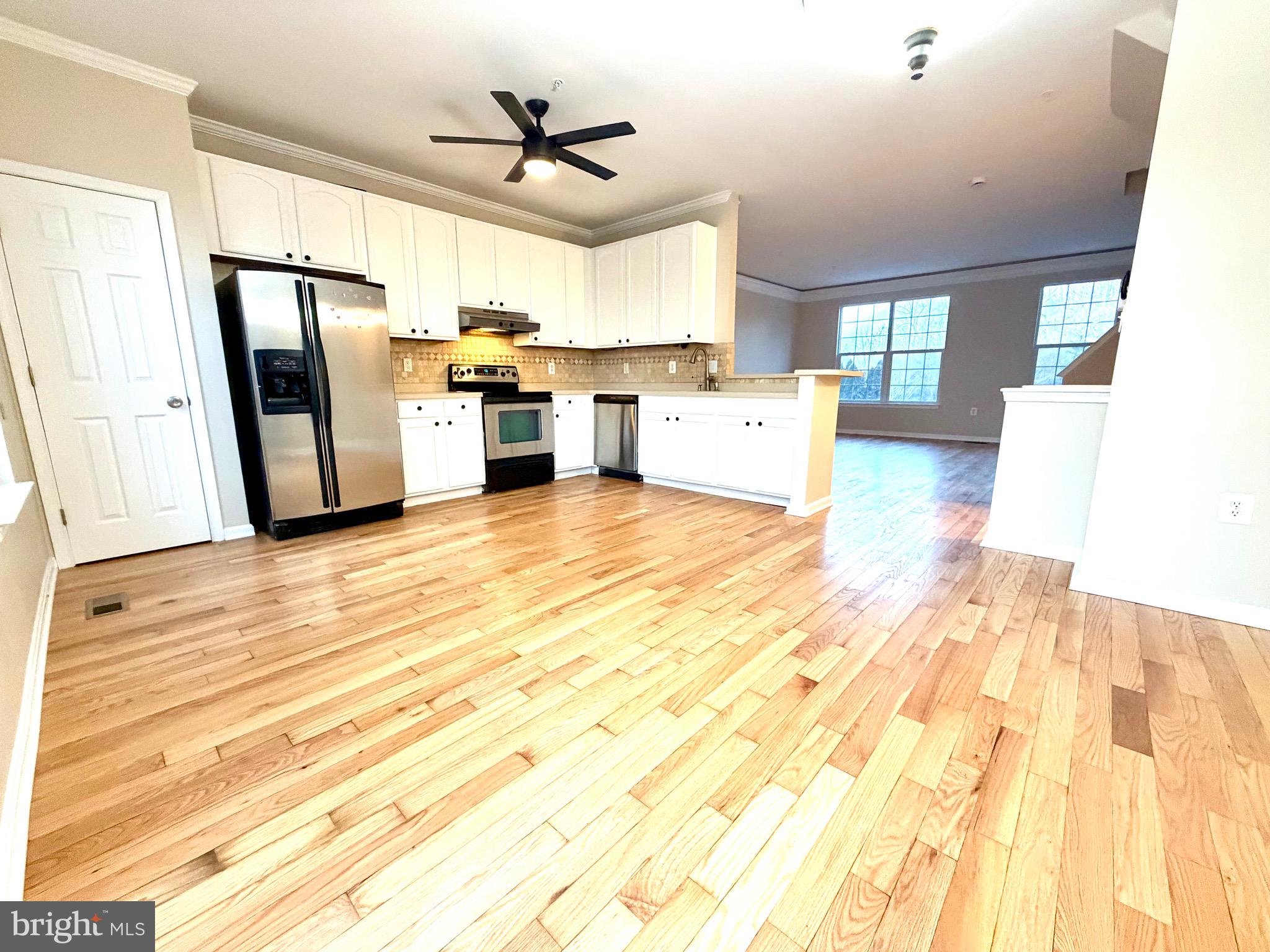 10158 Tree Frog Place White Plains, MD 20695 - Photo 11 of 25 a view of a kitchen with a sink
