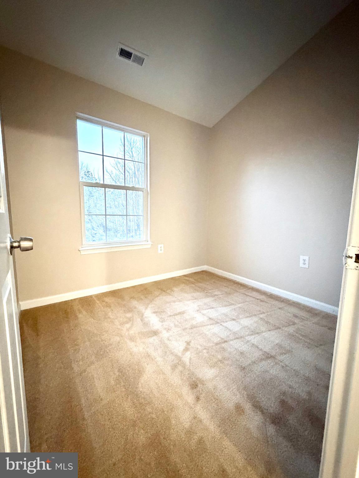 10158 Tree Frog Place White Plains, MD 20695 - Photo 25 of 25 an empty room with a empty space and a window