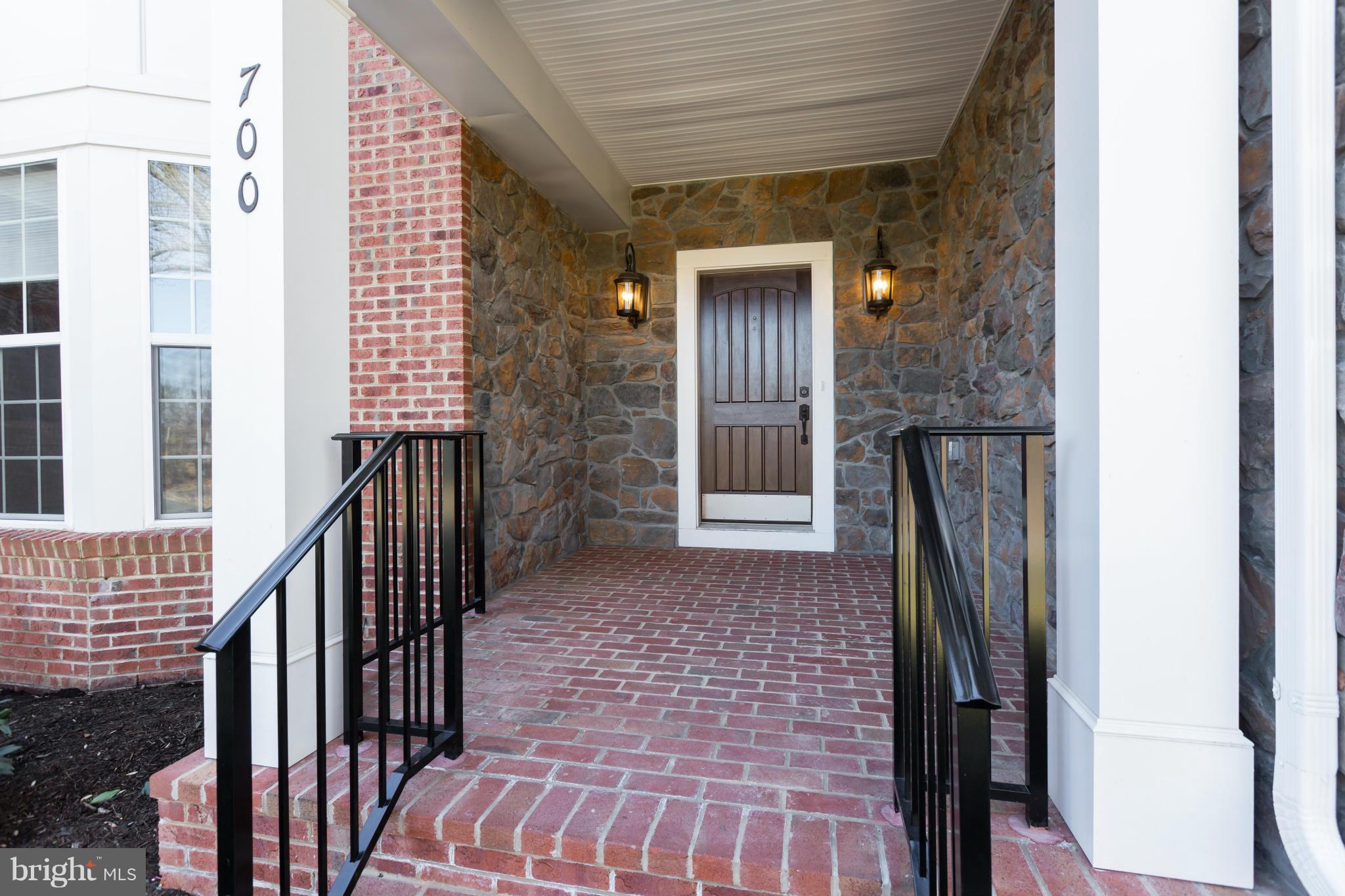 700 Walker Road Great Falls, VA 22066 - Photo 3 of 30 Covered stone porch