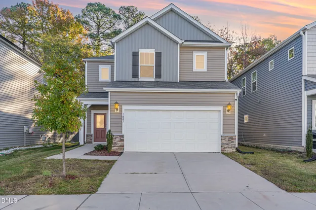 front view of house with a yard