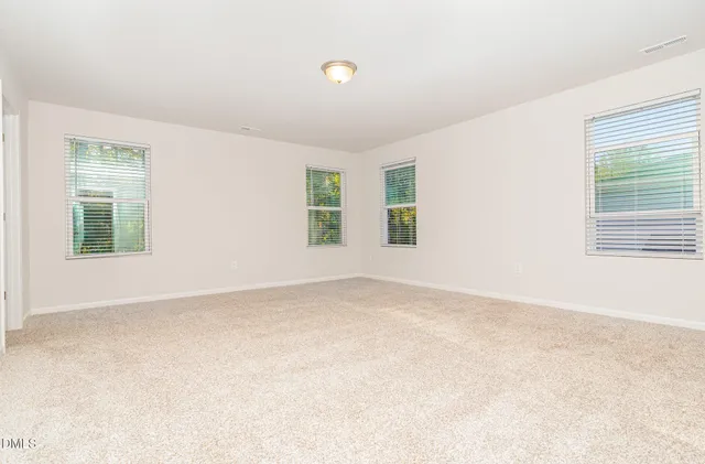 an empty room with an entryway
